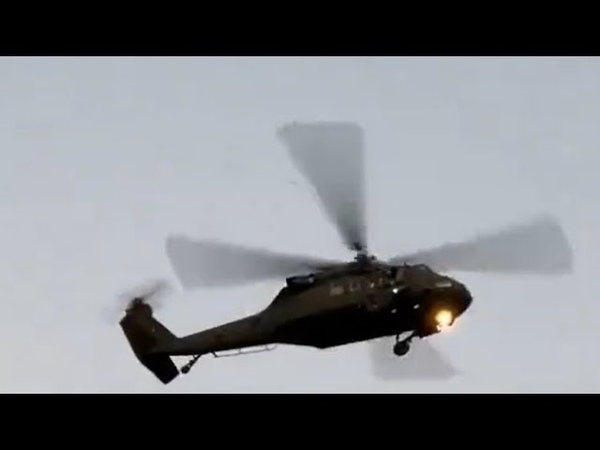Unmarked Military Style Helicopter Swoops Down, Destroys Staging Area for Flood Supplies In