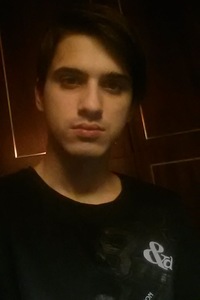 Максим Усиков